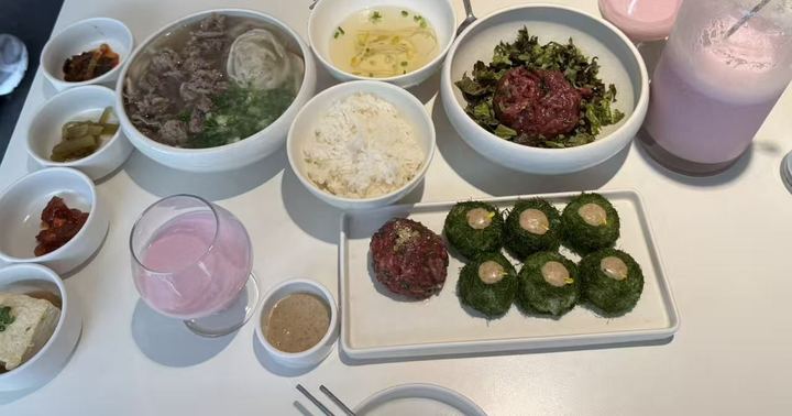 Hanwoo soup, yukhoe, seaweed rice balls and pink cherry makgeolli